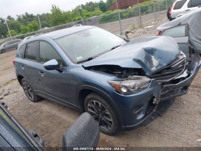  Salvage Mazda Cx