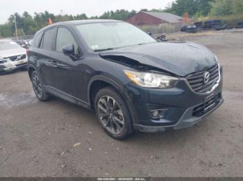  Salvage Mazda Cx